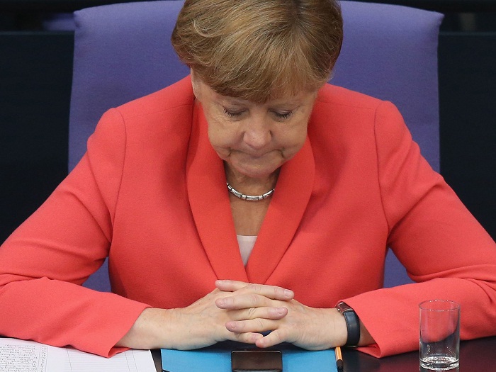 Time to step down? Merkel`s open-door refugee policy fails - OPINION